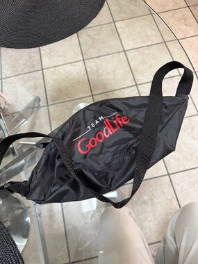 GoodLife Black Sling Bag with Red Logo Accent